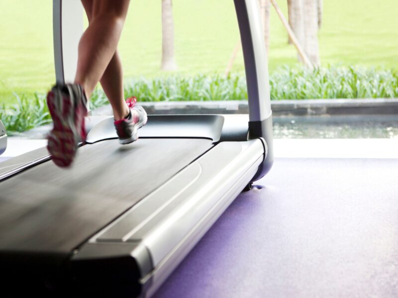 Female running on a treadmill